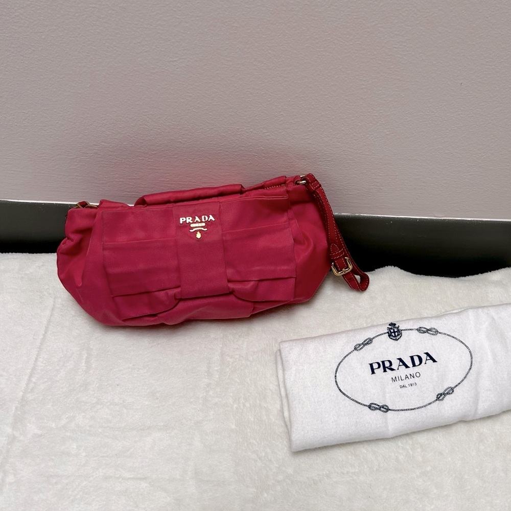 PRADA Bow Wristlet in pink ,”nylon”
